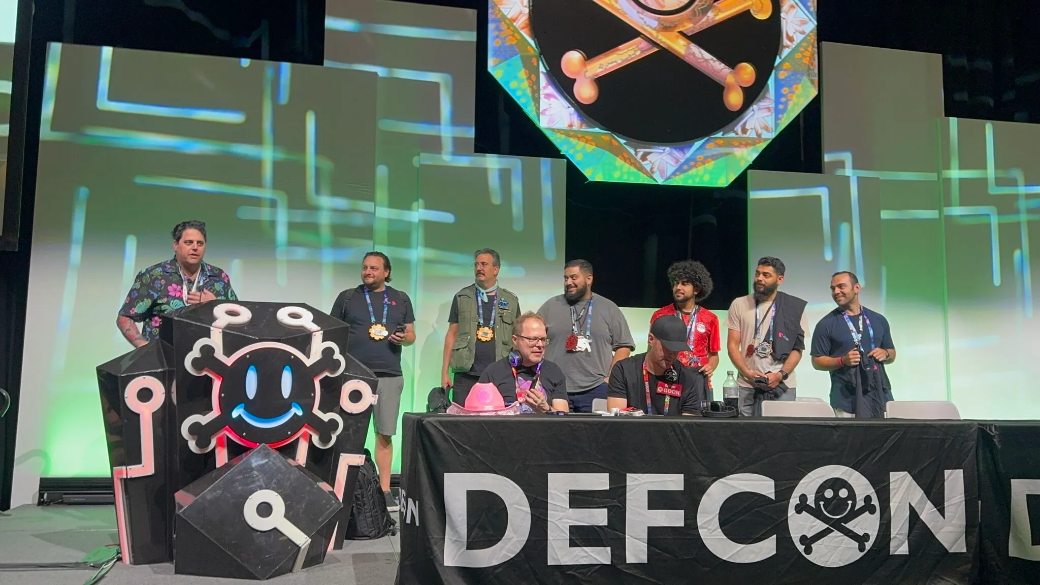 Contest organizers and teams on stage at the DEF CON 34 closing ceremonies
